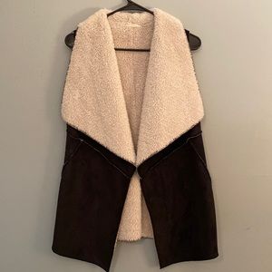 Black faux suede fleece lined vest.